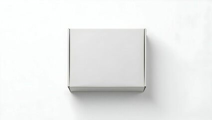 A Minimalist Commercial Stock Photo Featuring a Pristine White Shipping Box Placed Centrally on a Bright White Surface, Perfect for Product Mockups