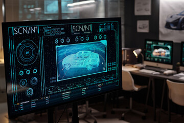 Screen of computer with three dimensional car prototype developed in engineering bureau or automotive design studio