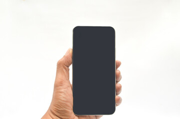 Mobile phone with black screen in men hand isolated on a white color background. Blank with an empty copy space for the text. Trendy collage in magazine urban style. Modern design