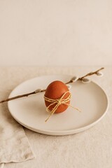 easter egg in a basket on wooden background