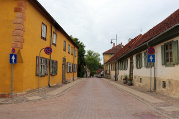 Street in the small town of Kuldiga in Latvia. Old stone houses.
