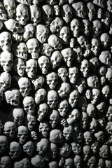 A wall of gloomy skulls.