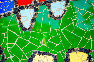 Pieces of tiles of different patterns and bright colors forming abstract figures. Pieces of tiles of different patterns and bright colors forming abstract figures, Cesar Manrique.