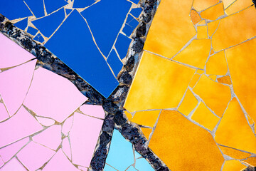 Pieces of tiles of different patterns and bright colors forming abstract figures. Pieces of tiles of different patterns and bright colors forming abstract figures, Cesar Manrique.