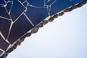 Pieces of tiles of different patterns and bright colors forming abstract figures. Pieces of tiles of different patterns and bright colors forming abstract figures, Cesar Manrique.