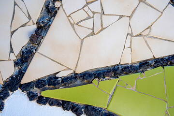 Pieces of tiles of different patterns and bright colors forming abstract figures. Pieces of tiles of different patterns and bright colors forming abstract figures, Cesar Manrique.