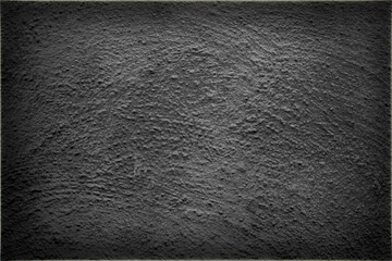 Closeup of plastered gray wall with many small cracks.