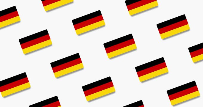 Moving pattern of tilted German flags on a black and white background