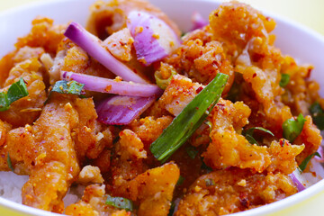 Rice with spicy crispy chicken salad