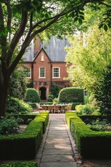 Obraz premium A peaceful garden pathway meanders gracefully toward a charming rustic brick house, enveloped by vibrant, lush greenery illuminated by the warm afternoon sunlight
