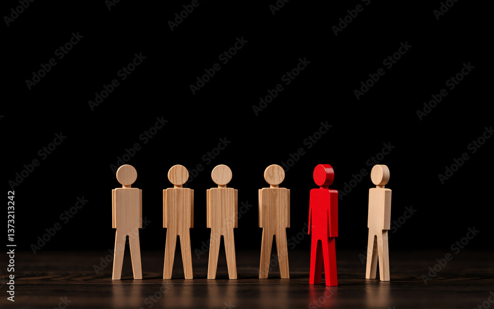 Poster a group of wooden figures are arranged on a dark surface with a black backdrop. one figure is distin