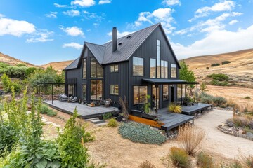 Fototapeta premium A contemporary black house featuring expansive windows sits nestled within a picturesque natural landscape, basking in the warmth of a vibrant, sunlit daytime