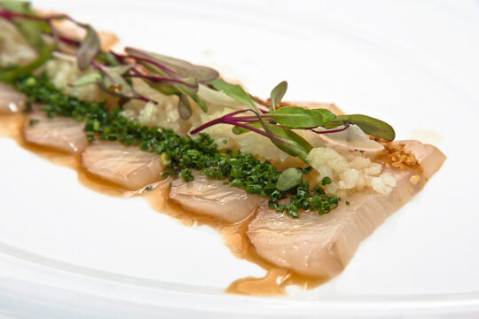 Kampachi, Japanese fish sashimi with beetroot, apple, and scallions, kanpachi, carpaccio