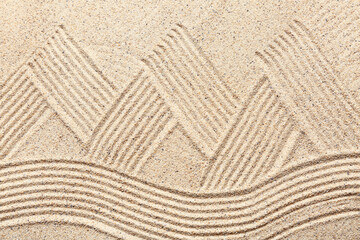 Light sand with pattern. Zen concept