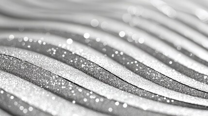 Minimal silver glitter background with sparkling metallic texture, perfect for festive and elegant visual designs