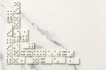 White dominos blocks on marble background