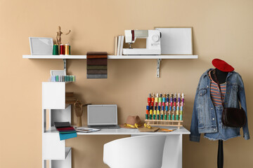 Interior of atelier with tailor's workplace, shelf and mannequin