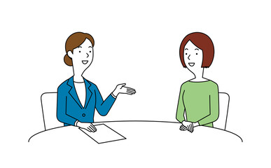 女性の相談員にアドバイスを聞く女性