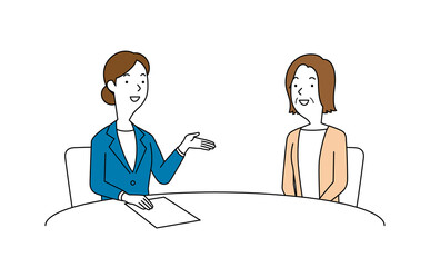 女性の相談員にアドバイスを聞く高齢の女性