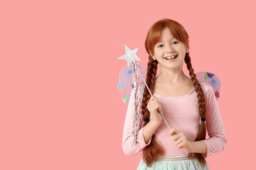 Cute redhead fairy with wand on pink background
