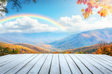 Landscape white wooden tabletop or platform empty set against stunning background. Rainbow and mountain cover changing leaves soft white clouds bright sunny skies perfect for showcasing products.