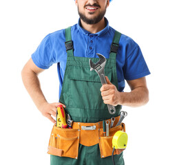 Happy male construction worker with wrench and professional tools isolated on white background, closeup