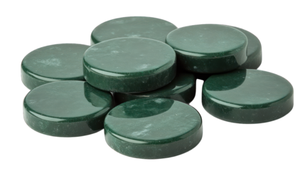 Green board game counter on a white background