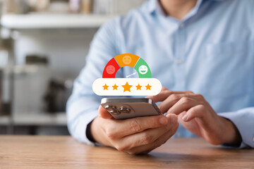Five-star customers use smartphone to review products with thumbs up icons, customer satisfaction...