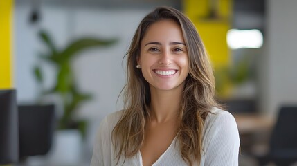 72. A smiling businesswoman from Brazil working on her startup is branding, exuding creativity and professionalism.