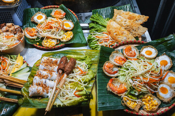 traditional Vietnamese street food on the counter at the Asian Night Market in Vietnam in Asia