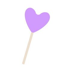 Decorative heart-shaped lollipop in soft purple on a wooden stick