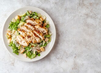 Chicken Caesar Salad with Parmesan Cheese on Plate Ready to Eat