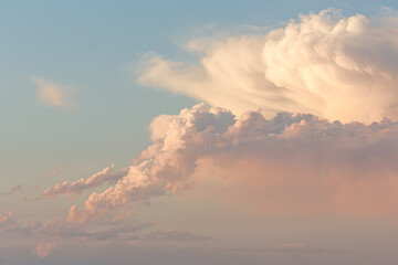 Cloud patterns at sunset against a blue sky