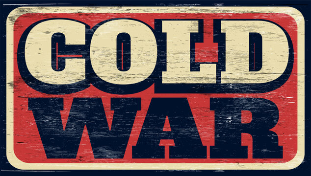 Aged and worn cold war sign on wood