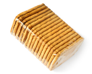 Cookies in transparent plastic packaging on a white background. Close-up of a pack of cookies.