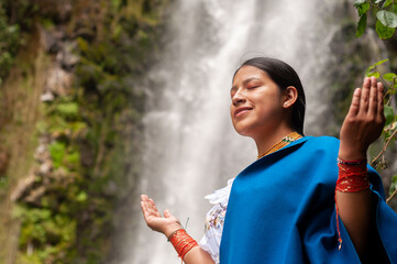 Embracing Nature A Profound Spiritual Moment Close to a Majestic Waterfall in Natures Embrace