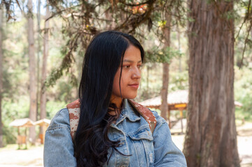 A Young Woman in Nature A Thoughtful and Reflective Outdoor Portrait Captured Beautifully