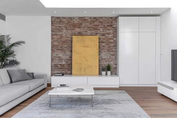 Modern living room with a minimalist design showcasing brick wall and stylish decor elements