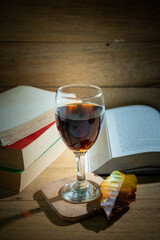 Books and wine glasses on the table