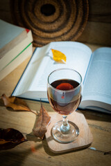 Books and wine glasses on the table