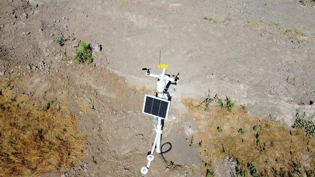 Solar powered independent standalone weather station with wind vane, anemometer, rain gauge, thermometer, humidity sensor, pyranometer, lightening arrester