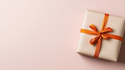 Elegant Gift Box with Orange Ribbon  Pastel Background  Festive Present