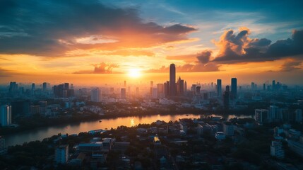 Fototapeta premium Sunset over city skyline urban landscape aerial view evening atmosphere peaceful serenity