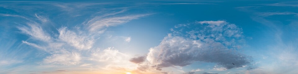 360 panorama of glowing sunset sky with bright Cirrus clouds. Seamless hdr spherical 360 panorama. Sky dome in 3D visualization, sky replacement for aerial drone panoramas. Weather and climate change