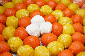 Colorful assortment of Indian sweets on festive display platters