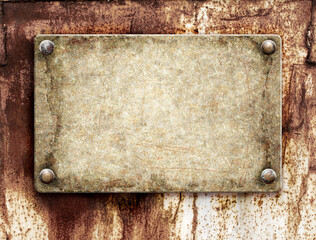 Fototapeta premium Old metallic plank with rivets on rusty metal surface. Vintage metal plate with nails. Can be used for steampunk, retro and vintage design. Mock up template. Copy space for text
