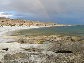 Rainbow over the sea.