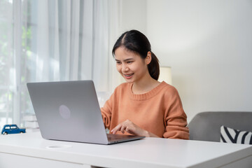 Woman hand using laptop and type on the keyboard.