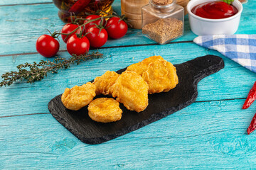 Golden crispy fried chicken nuggets