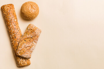 Homemade natural breads. Different kinds of fresh bread as background, top view with copy space